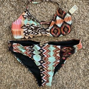 L*SPACE bikini, multi-color, strappy back. L bottom, M top, sold as set.